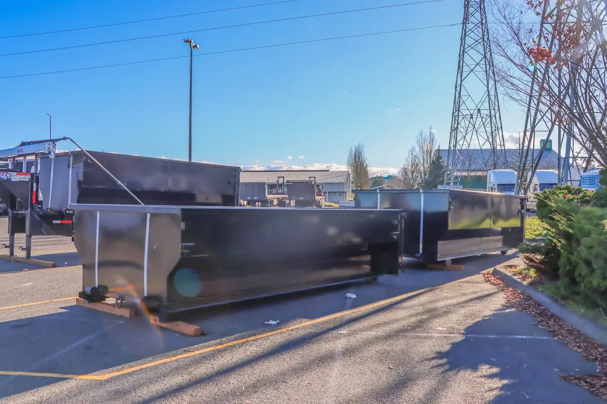 Roll-off dumpster ready for waste disposal at job site for 2 Yard Dumpster Rental in Middlebury